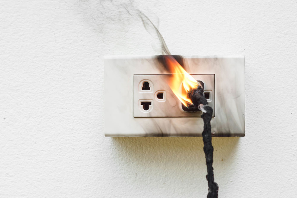 electric socket catching on fire due to product malfunction